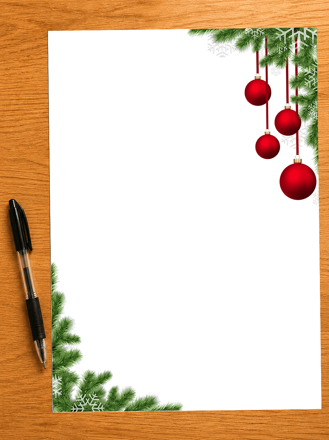 Writing paper with christmas baubles