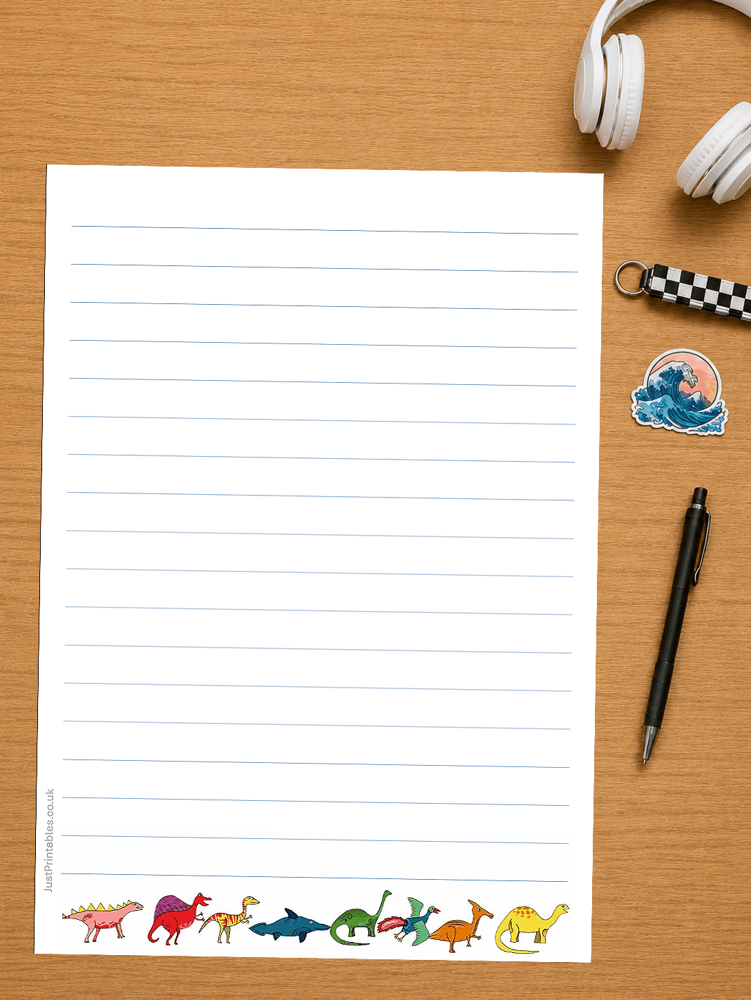 lined paper with dinosaurs
