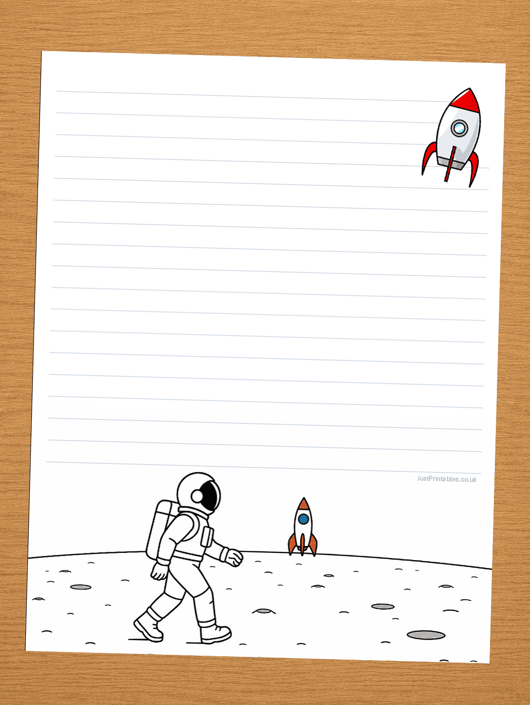 lined paper with spaceman