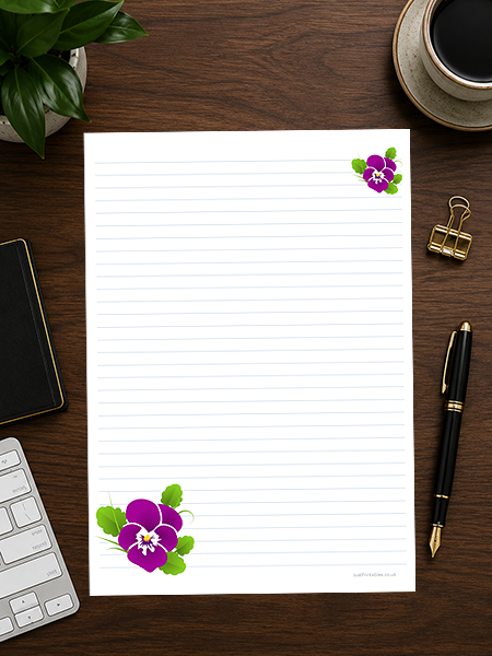 lined paper with violet pansies in two corners